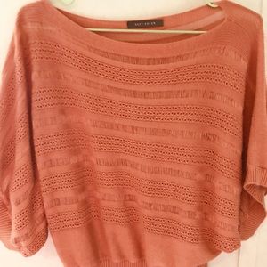 An off the shoulder ladies shirt/sweater